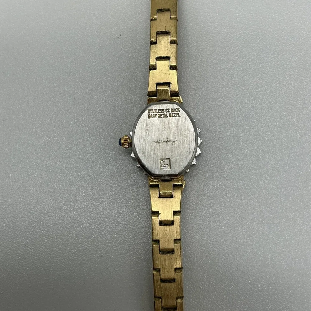 Geneva Womens Watch 16mm Champagne Dial Gold Tone Gemmed Blue Stones FOR PARTS